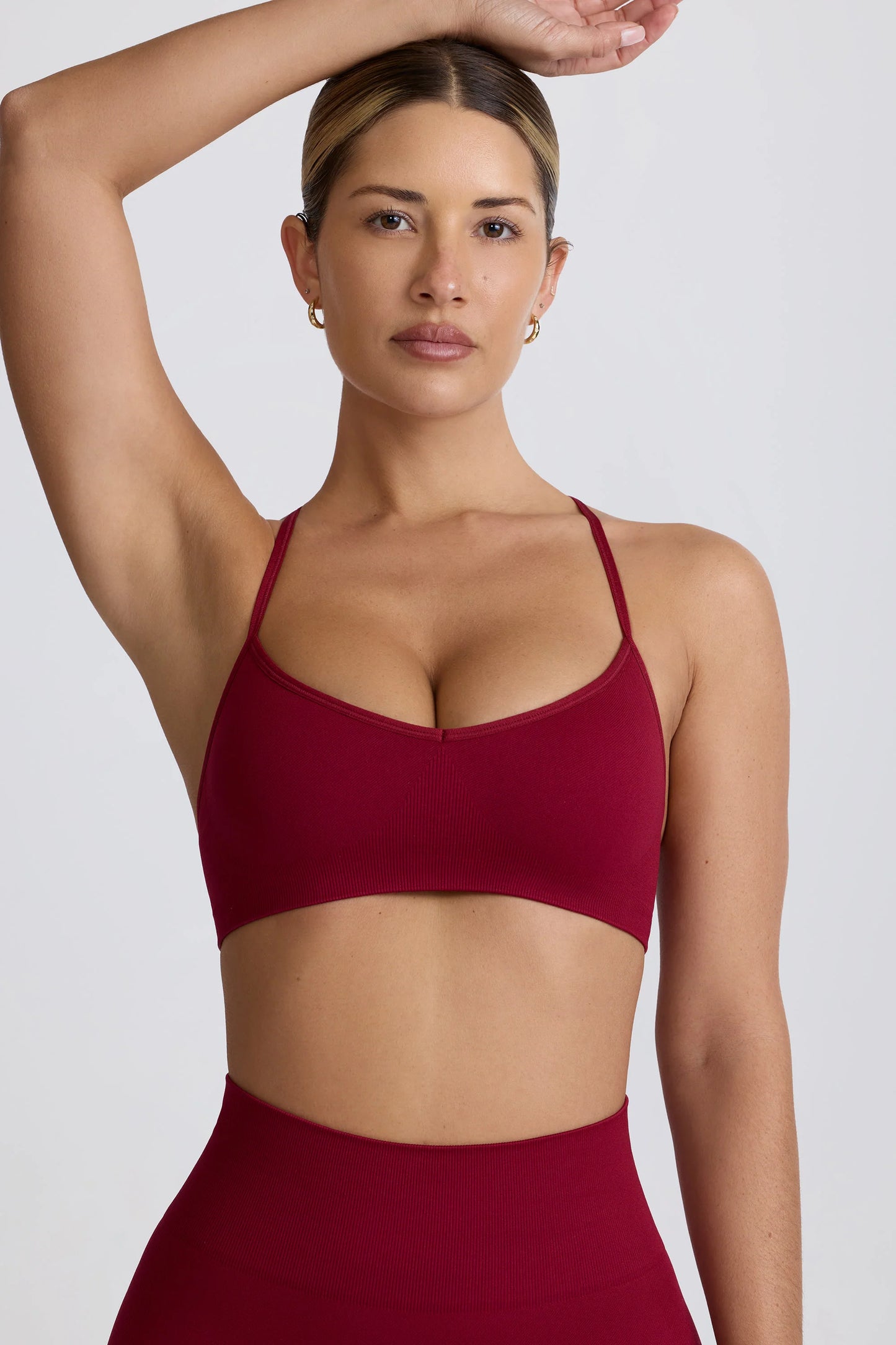 Super Sculpt Seamless Cross-Back Sports Bra in Burgundy