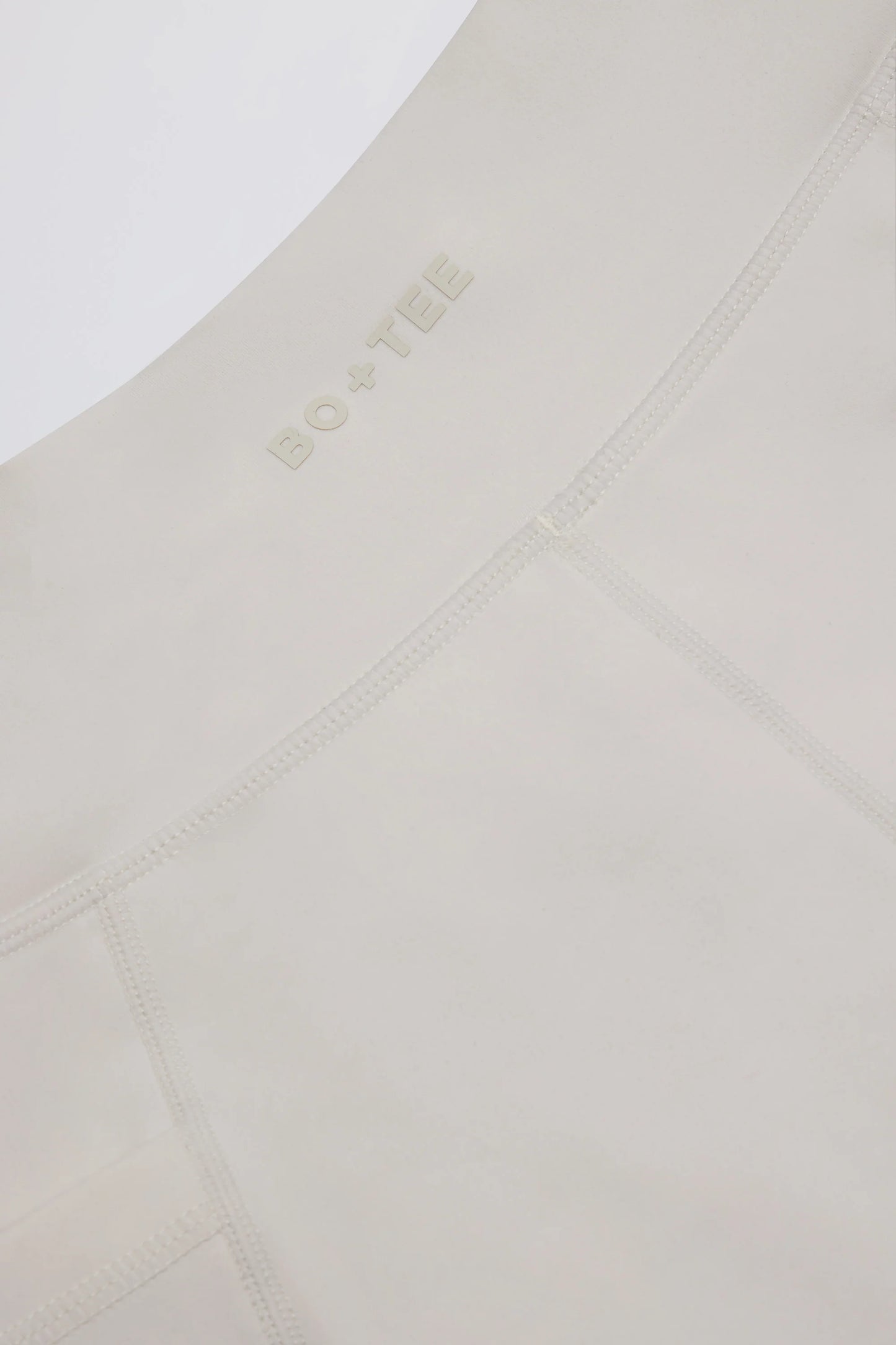 Soft Active Pocket V-Waist Mini Shorts in Cream