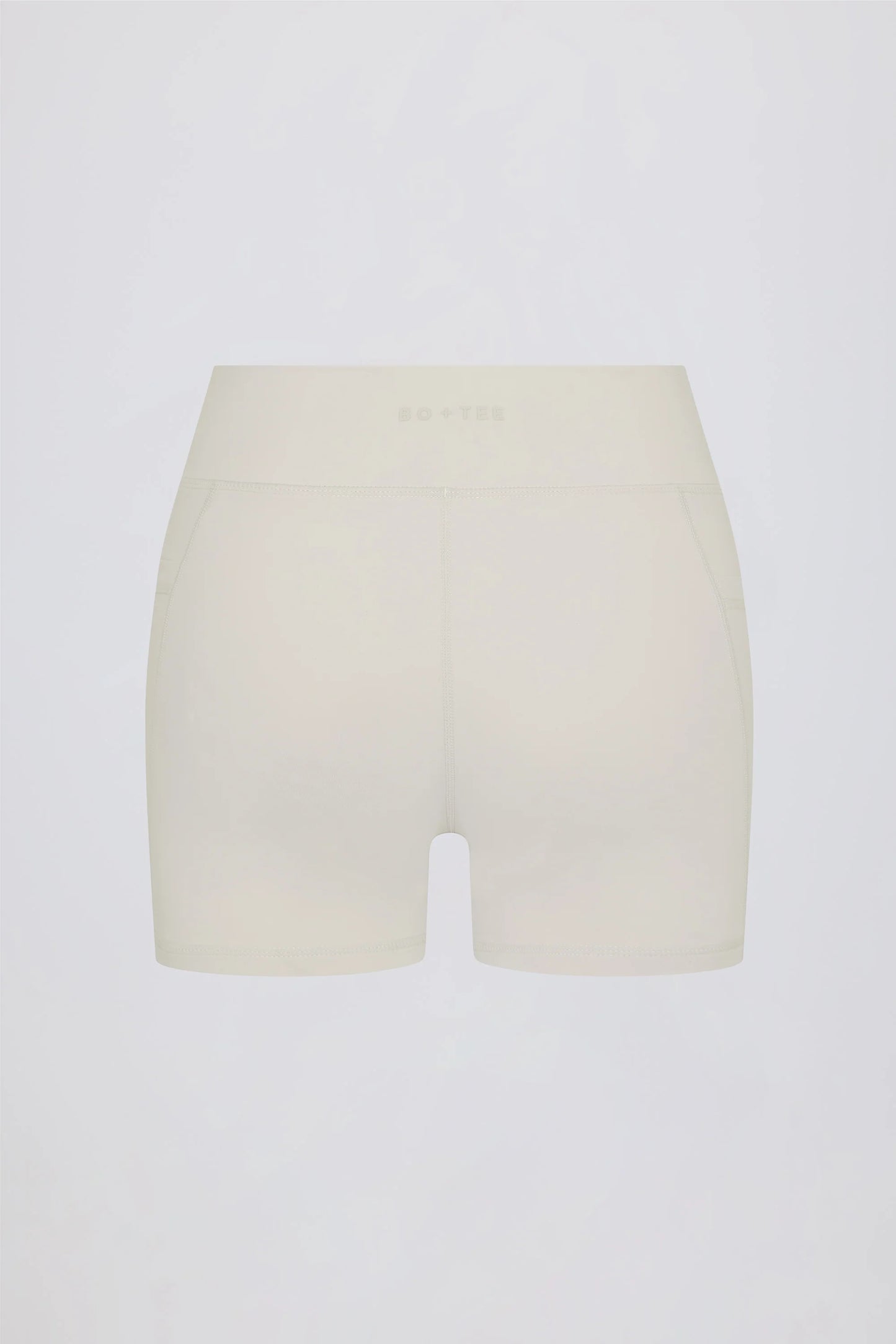 Soft Active Pocket V-Waist Mini Shorts in Cream