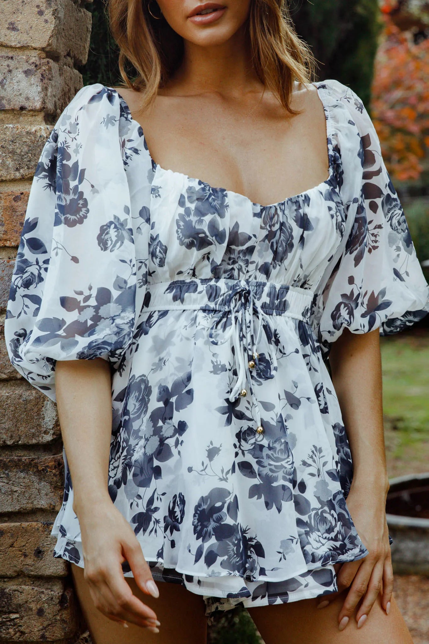 First Light Puff Sleeve Elasticated Waist Romper Floral Print Ink